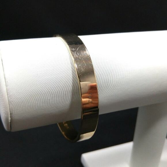 Anne Klein Solid Gold Tone Bangle Bracelet, 7 3/4 Inches, Very Reflective - Picture 4 of 8